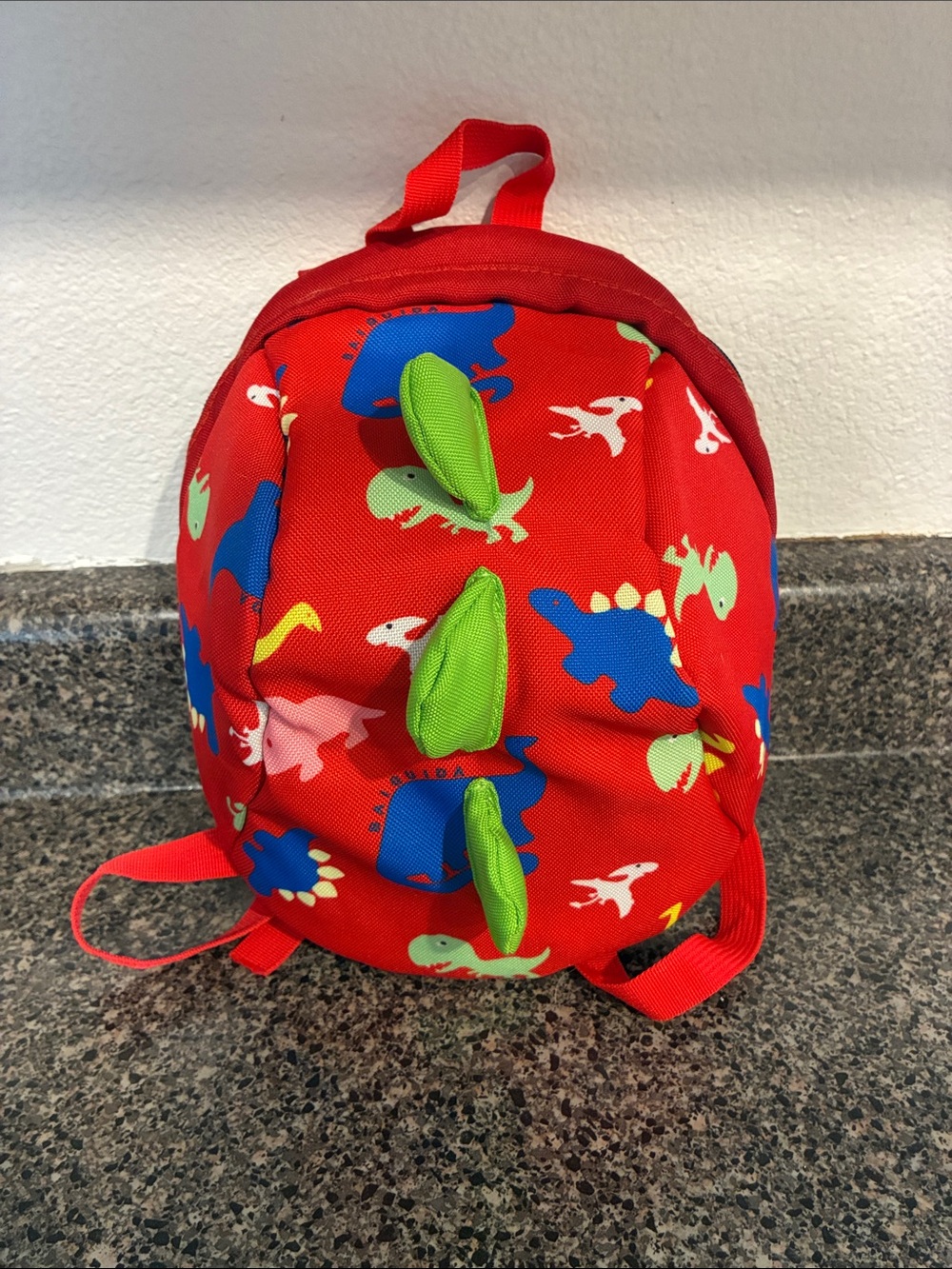 Red Dinosaur Kids Backpack with Green Spike Accents